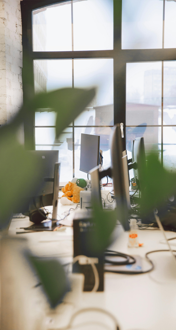 Creative office space with working people.